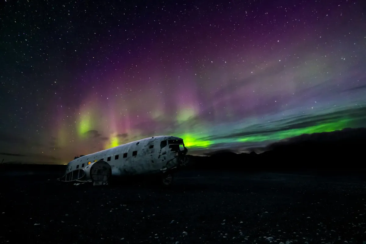 Aurora borealis over the DC-3 plane wreck in Iceland